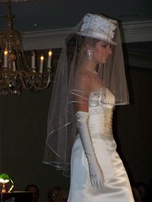 Wedding Cake Top Hat and shimmer veiling with silver edging